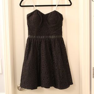 Short black dress with silver sleeves